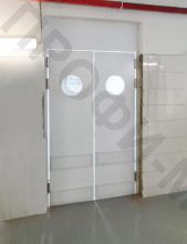 Дверь маятниковая двухстворчатая